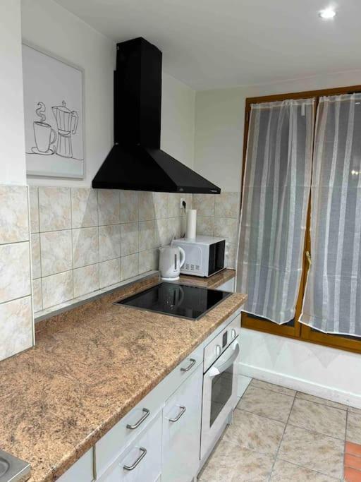Duplex Minimaliste - 30 Min De Paris Daire Saint-Ouen-l'Aumone Dış mekan fotoğraf